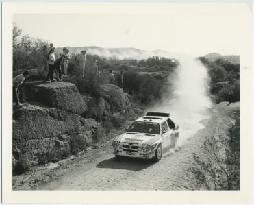 The driver Massimo Biasion in a Lancia Delta S4